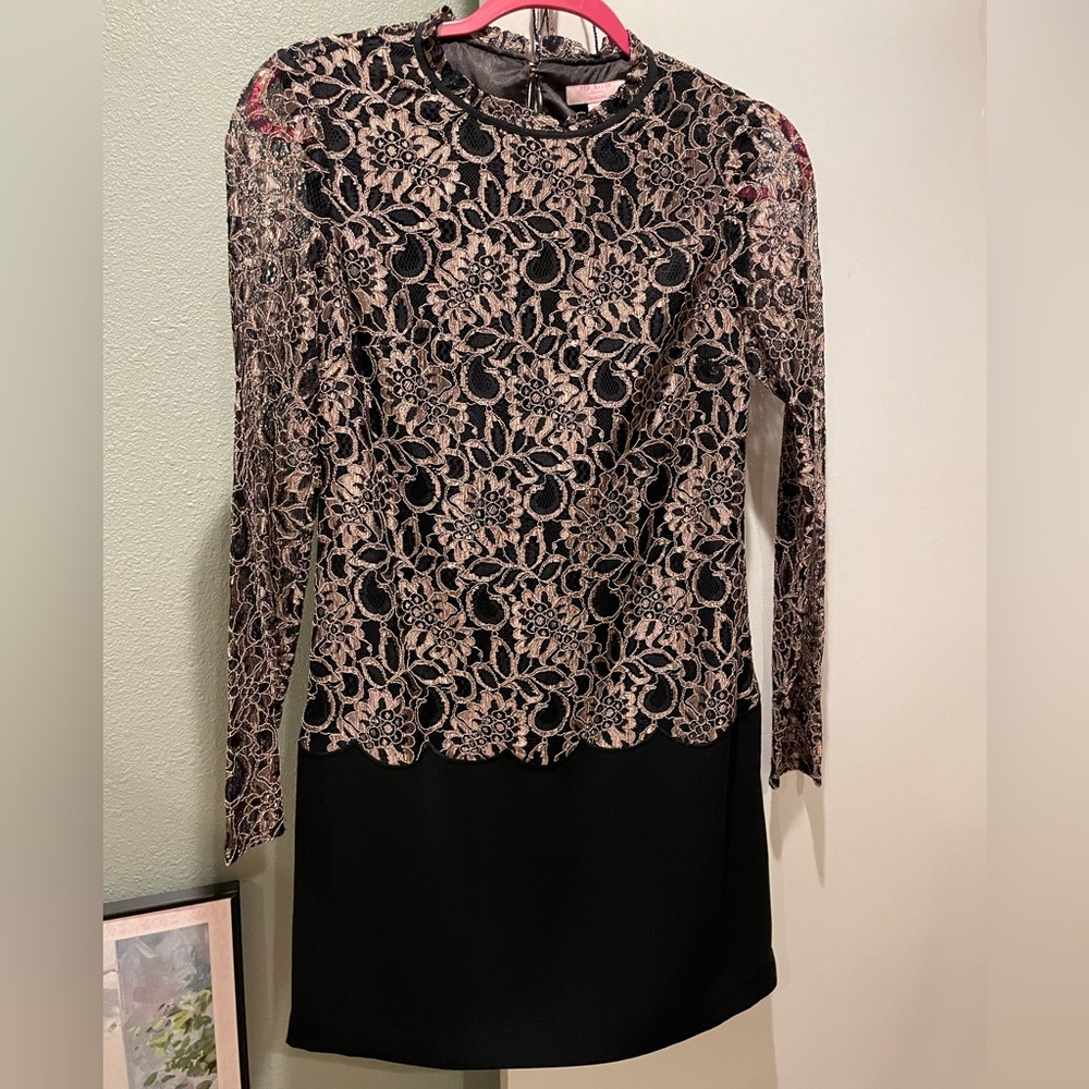 Black dress with goldish lace. Long sleeves